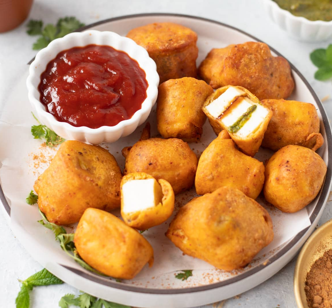 Paneer Pakora (Cottage Cheese Fritters) at Heritage India in Washington, DC 20016-3806 | YourMenu® Online Ordering