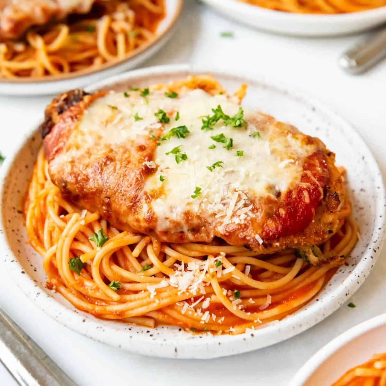 Lunch - Chicken Parmigiana with pasta at Italia Station Cafe in Pompano Beach, FL 33060 | YourMenu® Online Ordering
