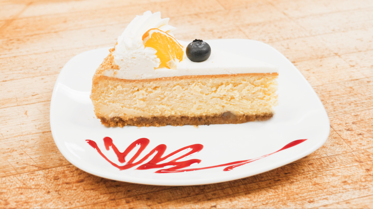 Citrus Cheesecake Slice at Marigold Cafe & Bakery in Colorado Springs, CO 80919 | YourMenu® Online Ordering
