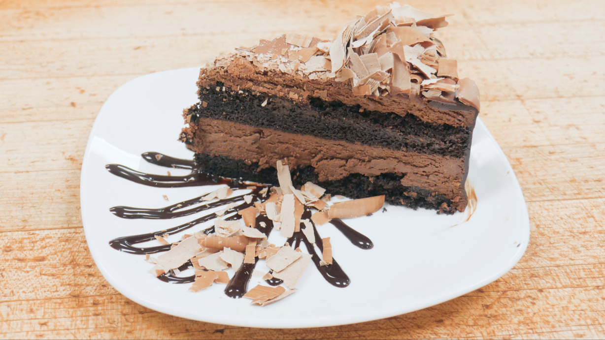 Double Chocolate Mousse Cake Slice at Marigold Cafe & Bakery in Colorado Springs, CO 80919 | YourMenu® Online Ordering