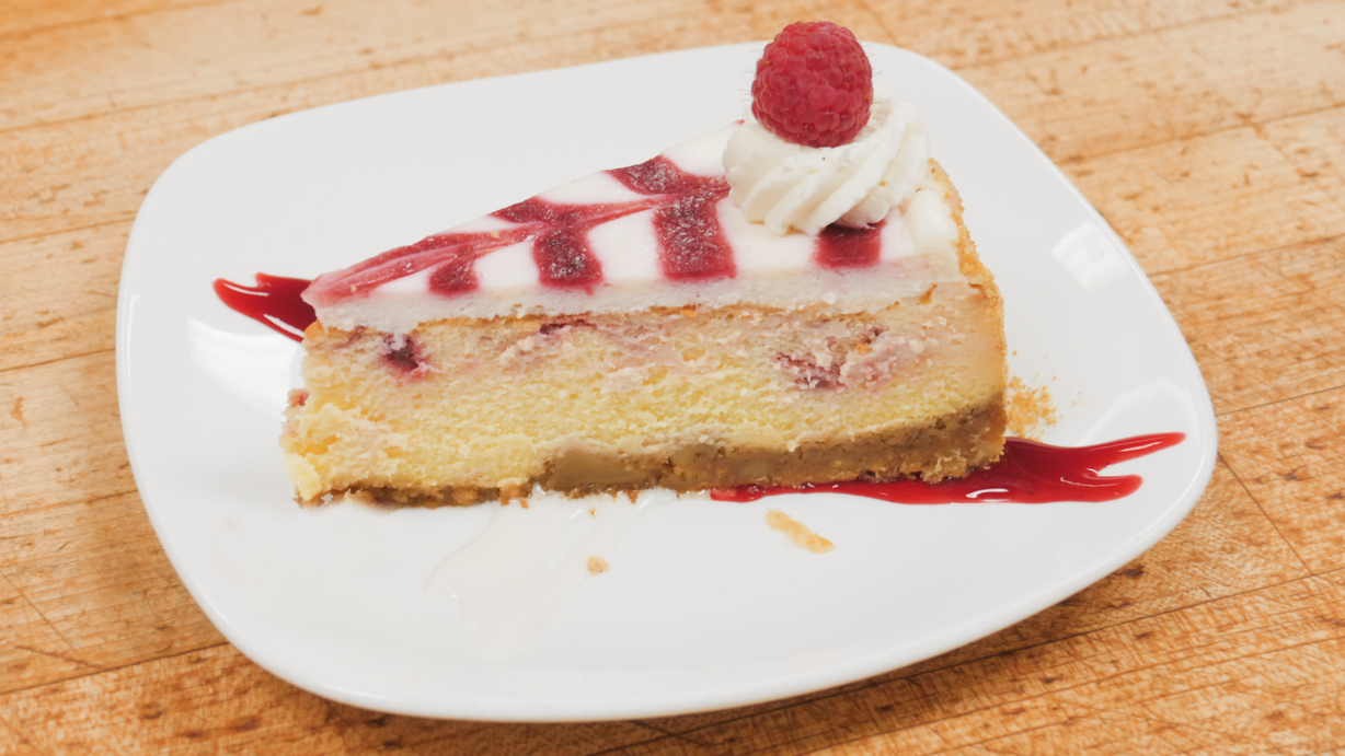 Raspberry Cheesecake Slice at Marigold Cafe & Bakery in Colorado Springs, CO 80919 | YourMenu® Online Ordering