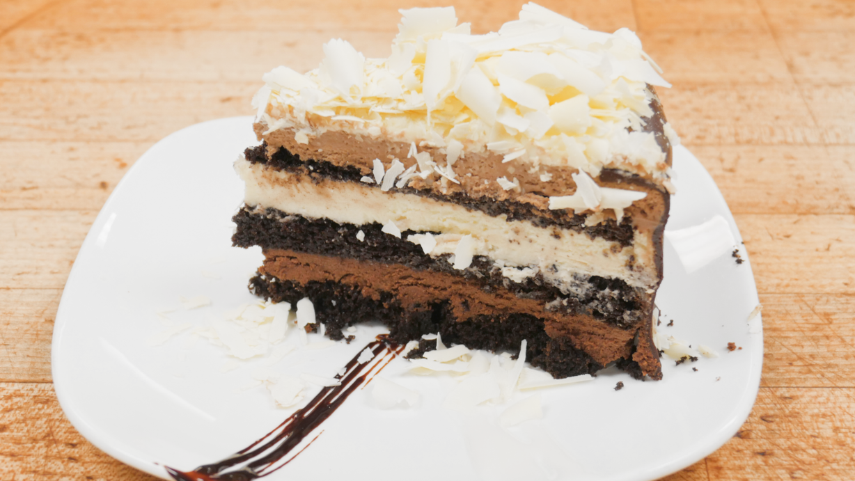 Triple Chocolate Mousse Cake Slice at Marigold Cafe & Bakery in Colorado Springs, CO 80919 | YourMenu® Online Ordering