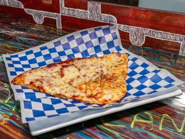 Jumbo Slice Pizza at Marathon Deli in College Park, MD 20740 | YourMenu Online Ordering