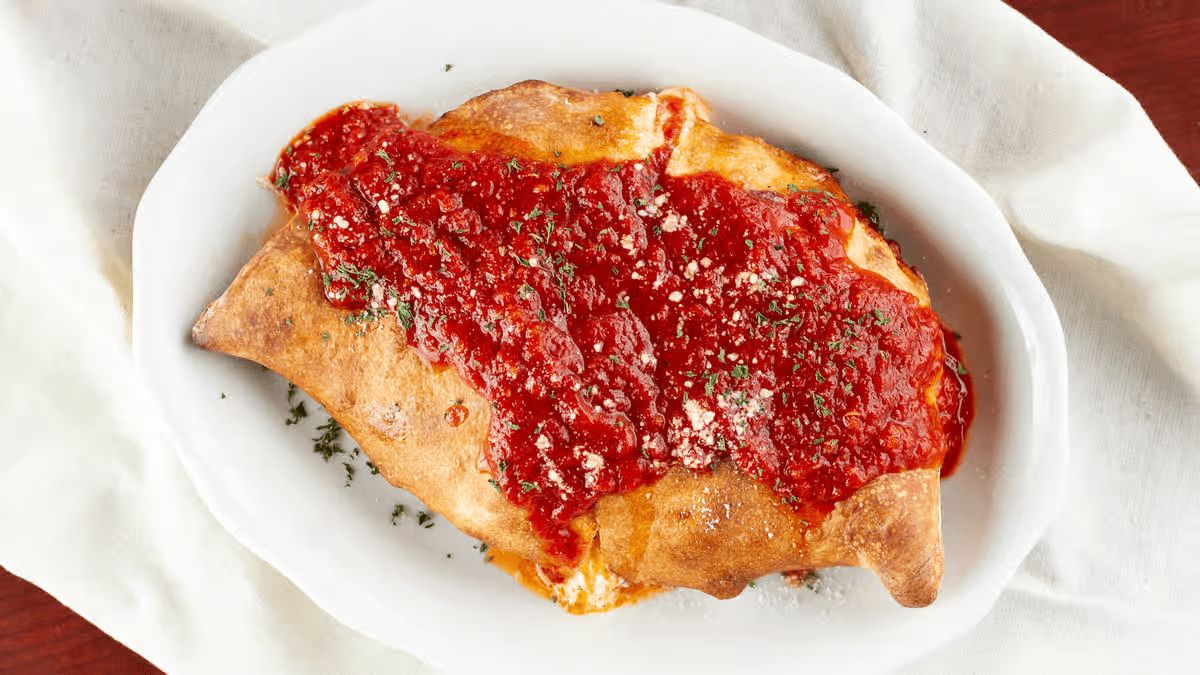 Meat Lover's Calzone-Special at Three Brothers Pizza in HYATTSVILLE, MD 20783 | YourMenu Online Ordering