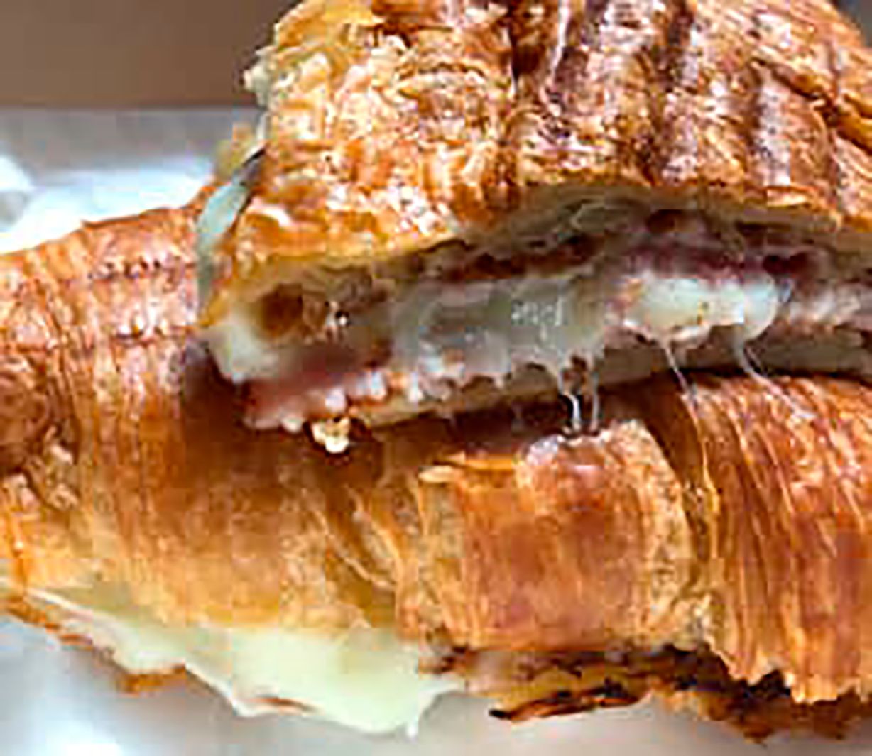 Grilled Ham & Cheese Sandwich On Croissant at Oakland Coffee & Juice Bar in OAKLAND PARK, FL 33334 | YourMenu Online Ordering