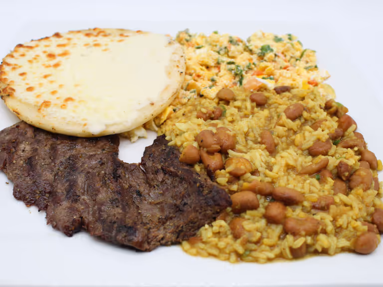 Calentado: Huevos Perico, Carne Asada, Arepa, Arroz y Frijoles at Dager's Restaurant in Hialeah, FL 33012 | YourMenu Online Ordering Calentado: Huevos Perico, Carne Asada, Arepa, Arroz y Frijoles at Dager's Restaurant in Hialeah, FL 33012 | YourMenu Online Ordering