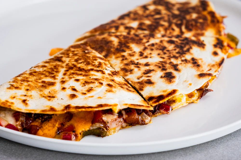 Quesadilla at Corinto Restaurant in District Heights, MD 20747 | YourMenu Online Ordering Quesadilla at Corinto Restaurant in District Heights, MD 20747 | YourMenu Online Ordering