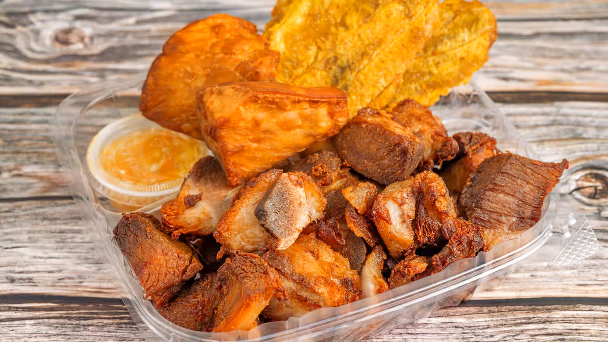 Griot Fried Pork Platter at PAUL'S UNIQUE GOURMET WP in West Palm Beach, FL 33409 | YourMenu Online Ordering