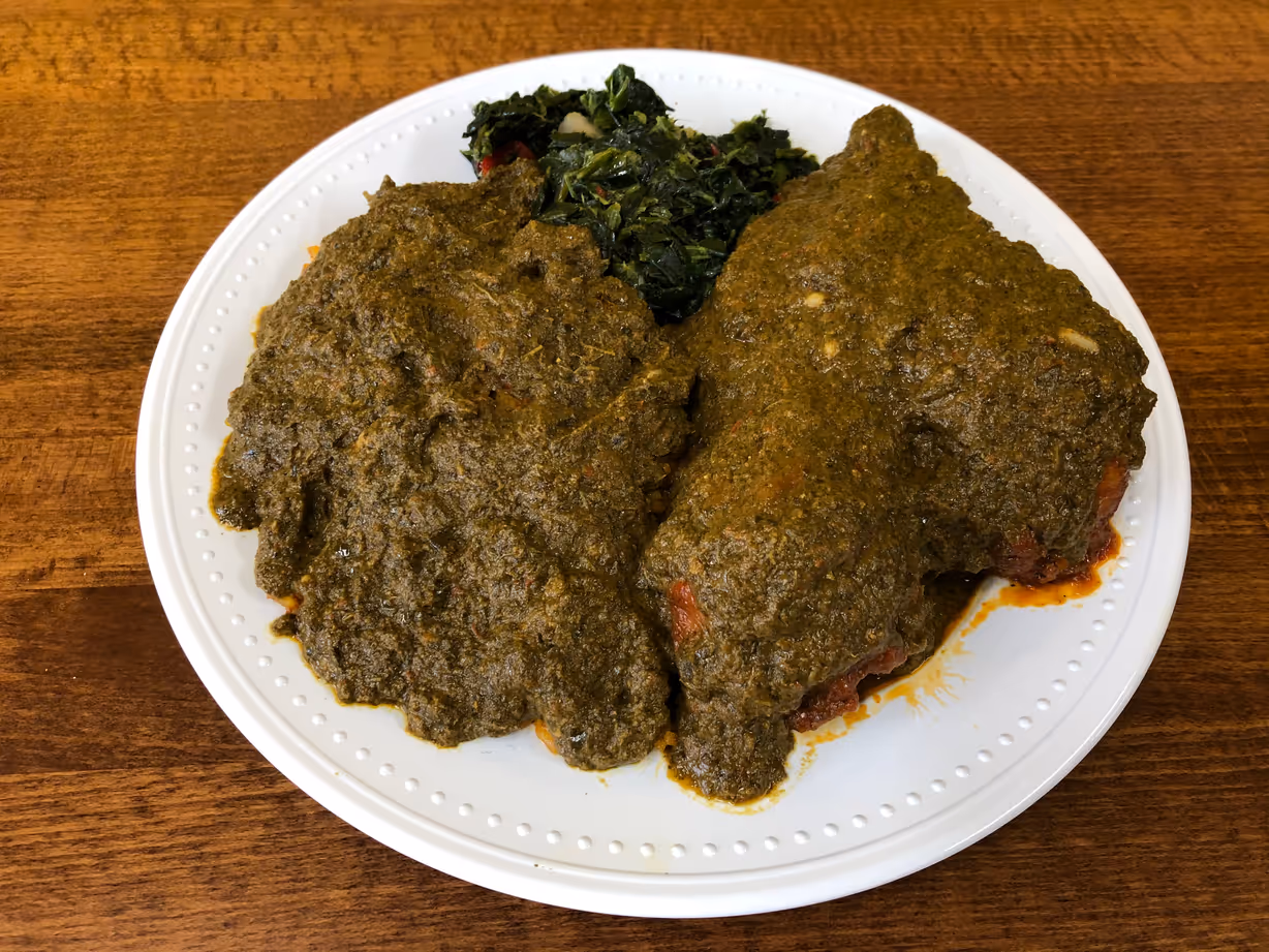 Cassava leaves w/ rice & a side at Jodeem African Cuisine in Greenbelt, MD 20770 | YourMenu Online Ordering Cassava leaves w/ rice & a side at Jodeem African Cuisine in Greenbelt, MD 20770 | YourMenu Online Ordering