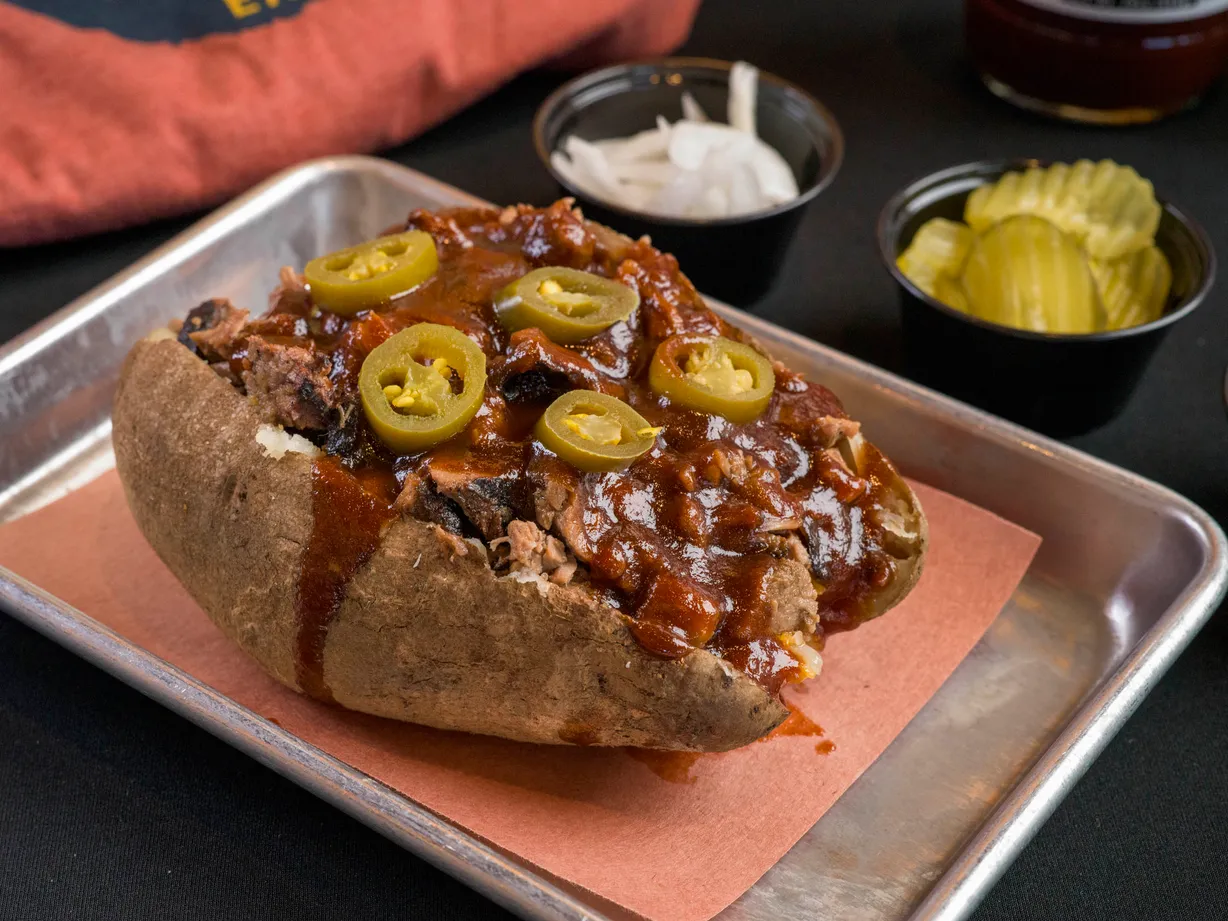 Chopped Pork BBQ Loaded Potato at Earnest B's BBQ in Frisco, TX 75033 | YourMenu Online Ordering Chopped Pork BBQ Loaded Potato at Earnest B's BBQ in Frisco, TX 75033 | YourMenu Online Ordering