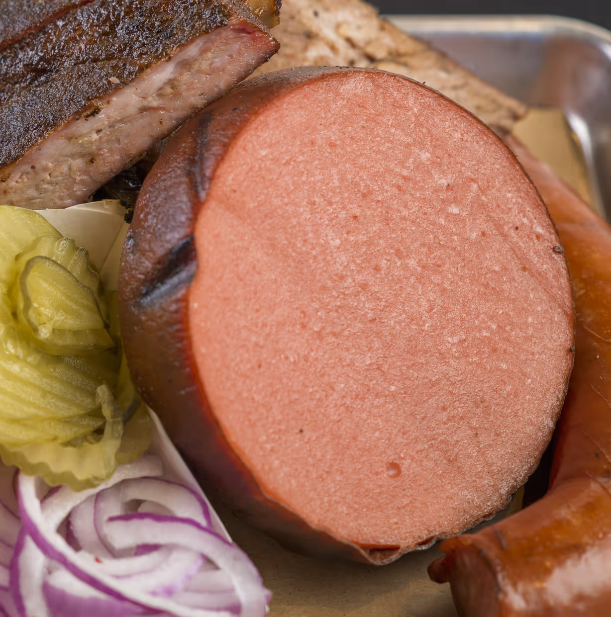 Smoked Bologna at Earnest B's BBQ in Frisco, TX 75033 | YourMenu Online Ordering Smoked Bologna at Earnest B's BBQ in Frisco, TX 75033 | YourMenu Online Ordering