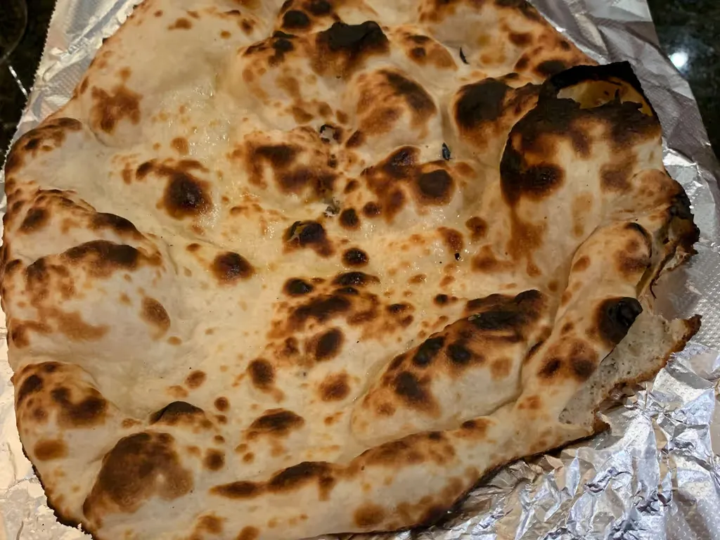 Naan at Heritage India in Washington, DC 20016-3806 | YourMenu Online Ordering Naan at Heritage India in Washington, DC 20016-3806 | YourMenu Online Ordering