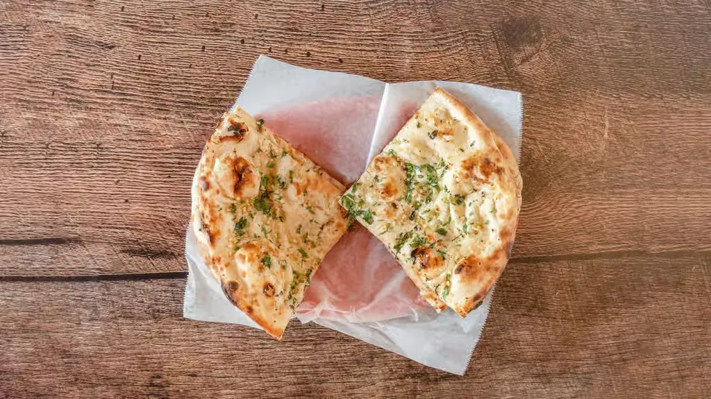 Garlic Naan at Tandoori Fire in SACRAMENTO, CA 958143507 | YourMenu Online Ordering Garlic Naan at Tandoori Fire in SACRAMENTO, CA 958143507 | YourMenu Online Ordering