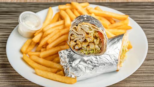 CHICKEN SHAWERMA SANDWICH at Raouch Cafe in Falls Church, VA 22042 | YourMenu® Online Ordering