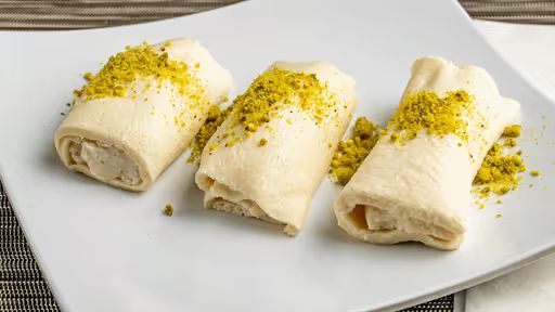 Halawet Aljibn 3 Pcs at Raouch Cafe in Falls Church, VA 22042 | YourMenu® Online Ordering
