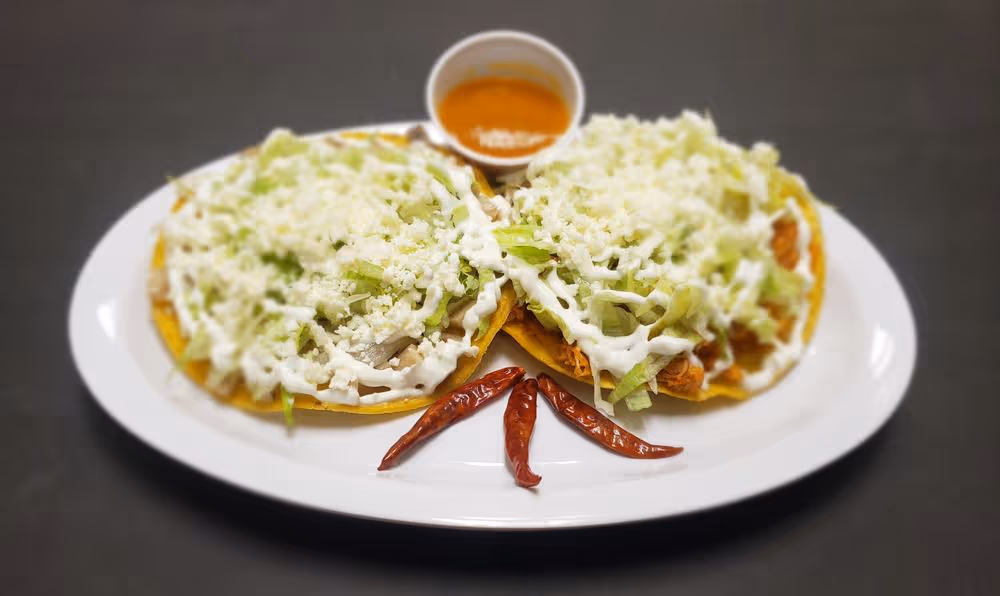 Tostada de tinga de Pollo at Sabor Azteca Restaurant in Gaithersburg, MD 20877