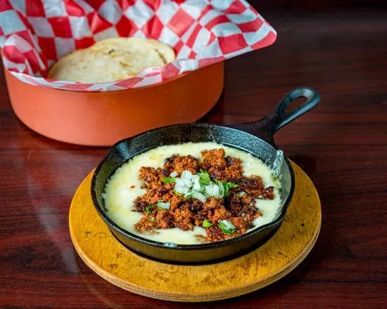 Queso Fundido Con Chorizo at ¡No Manches! Que Rico in Miami, FL 33144 Queso Fundido Con Chorizo at ¡No Manches! Que Rico in Miami, FL 33144