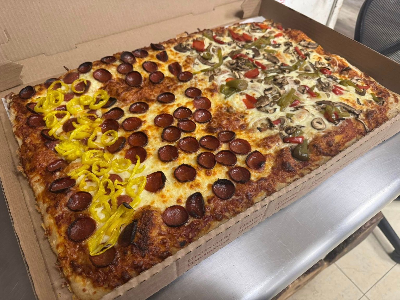 Pizza food available at The Village Pizzeria in East Amherst, NY 14051 Pizza food available at The Village Pizzeria in East Amherst, NY 14051