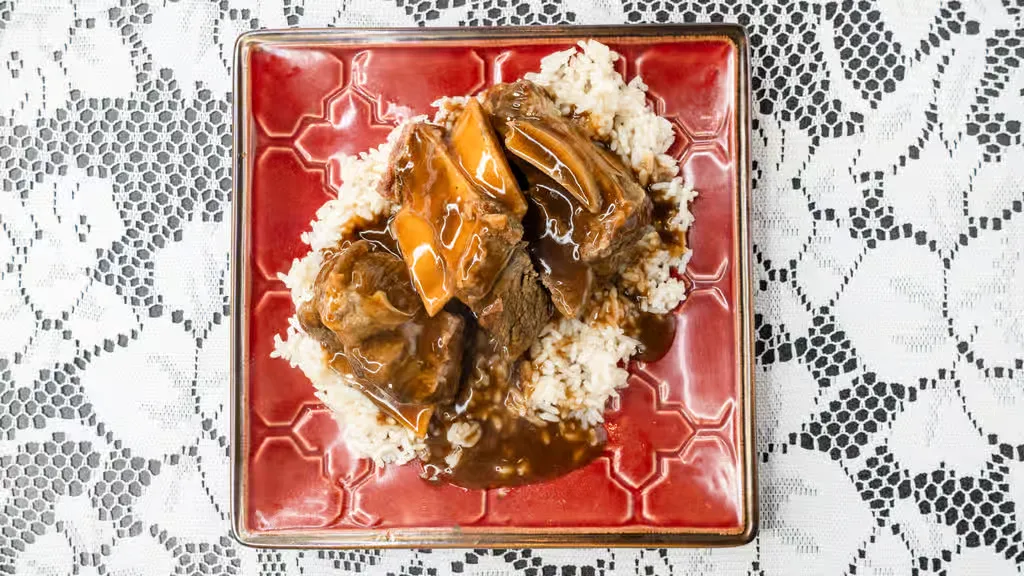 Braised Beef Short Rib Platter at EllaRay's Cafe in District Heights, MD 20747